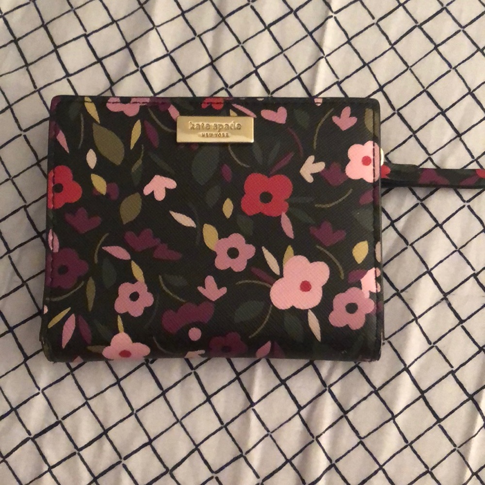 Last week to buy! Kate spade fold wallet